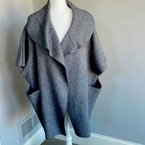 Open, cap sleeved sweater